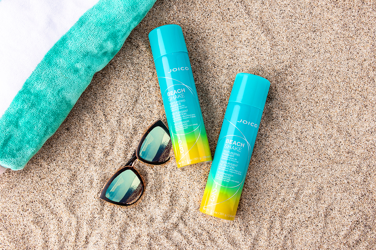 Joico beach shake bottles in sand