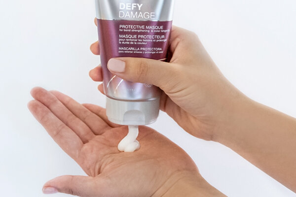 defy-damage-masque-in-hand