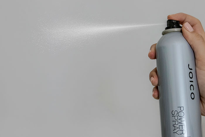 Power Spray spraying from bottle