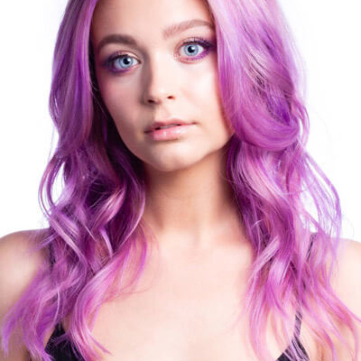 Larisa Love hair model showing vibrant purple hair color