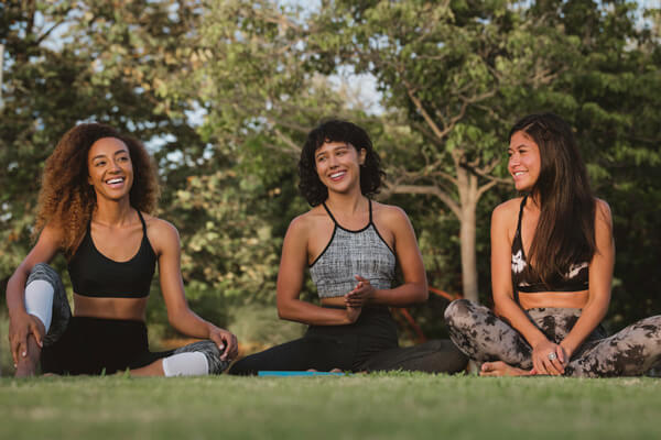 Women in park stretching