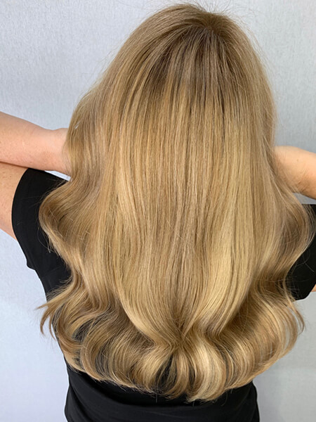 Golden-Hour-GLow Curled Blonde Hair