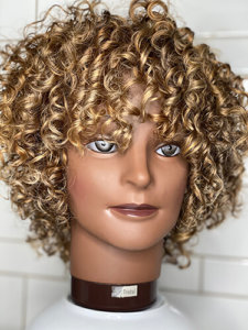 Mannequin head with highlighted curly hair