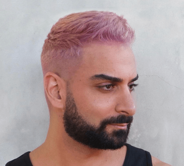 Man with short pink buzzed hair