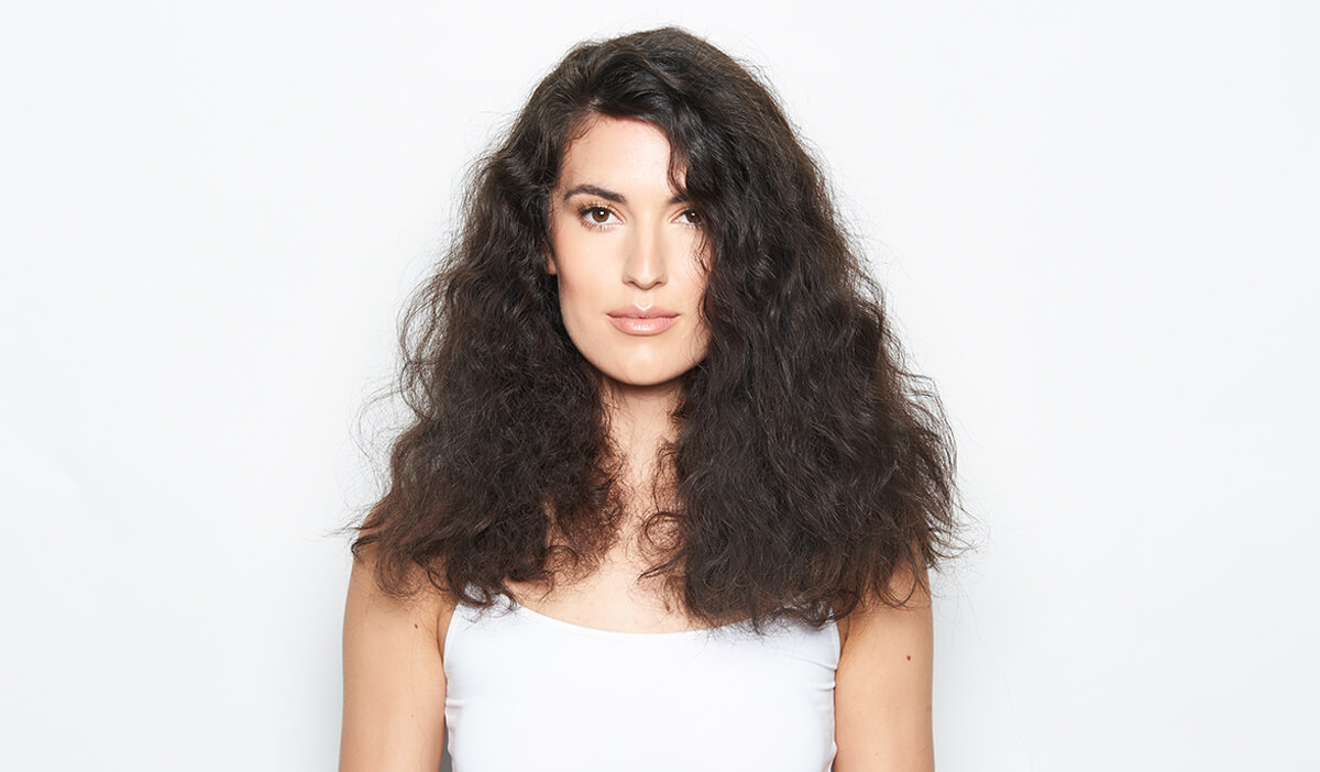 Women with frizzy brunette hair