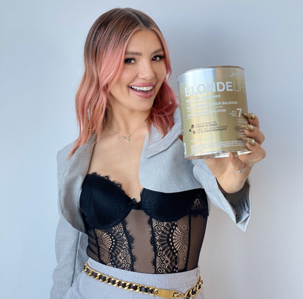 larisa love holding blonde life lightener