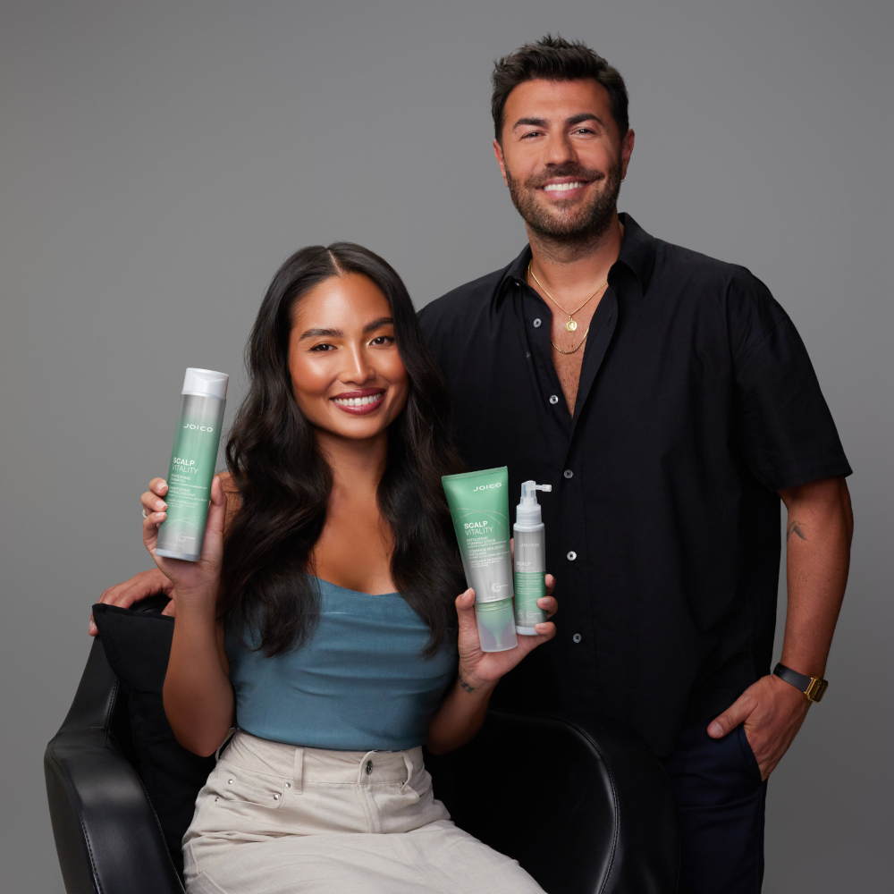 richard mannah and model holding scalp vitality products