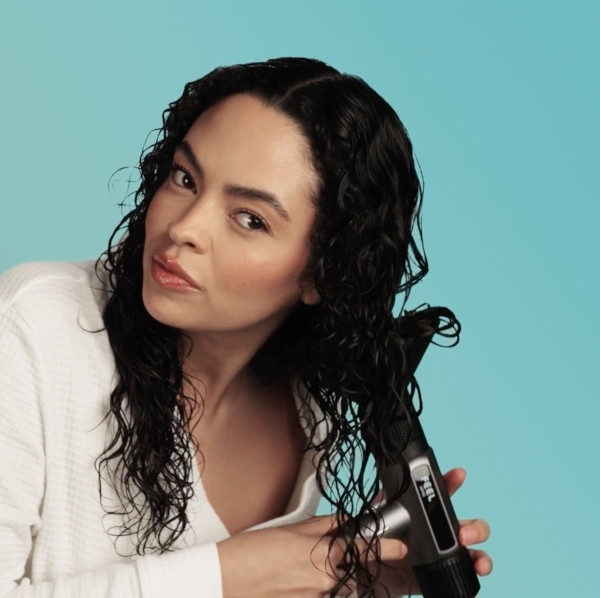 model using diffuser on hair