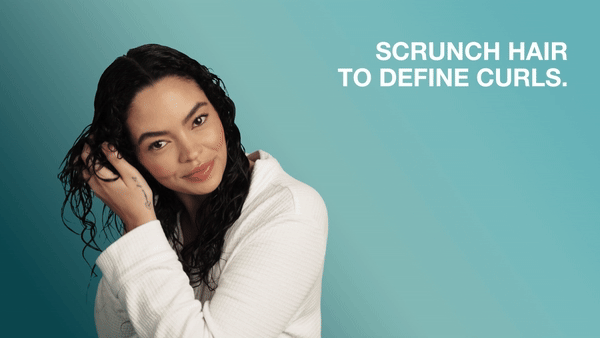 hair model scrunching hair with hands