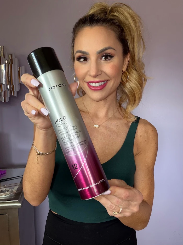 Vanessa Drozda with ponytail holding Heat Hero bottle